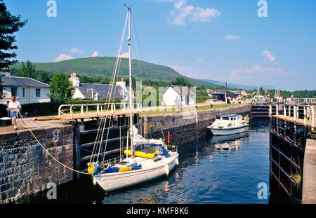 Pleasure boats pass through locks on Neptune's Staircase at Banavie on the Caledonian Canal near Fort William, Scotland Stock Photo