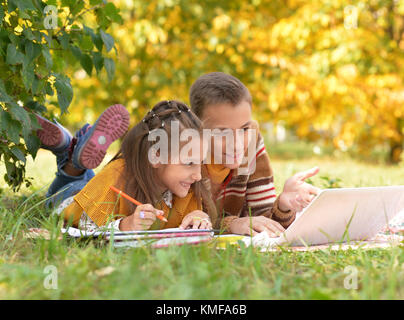 little girl looking at laptop Stock Photo