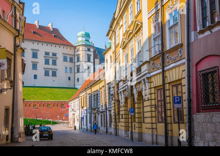 Krakow old town, view of the colourful thoroughfare of Kanonicza Street in Krakow, Poland, leading to the Wawel Royal Castle. Stock Photo