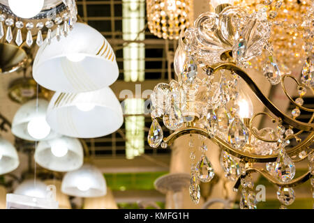 Various chandeliers at home furnishings store Stock Photo