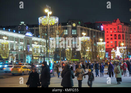 MOSCOW, RUSSIA - DECEMBER 29TH 2016: New Year and Christmas Decorations and lights in the streets of Moscow. People walking along Tverskaya street. Stock Photo
