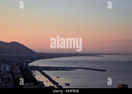Panorama of a small Italian port city in the mountains on the Amalfi coast at dawn