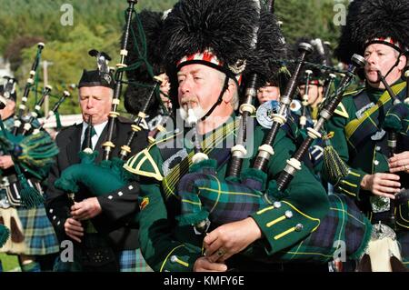 Traditional Scottish pipe band at the Lonach Highland Games at Strathdon, near Balmoral,  Grampian Region, Scotland, UK Stock Photo