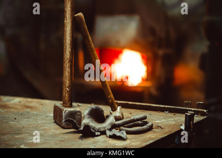 Hand anvil. hummers all blacksmith tools in forge. Stock Photo