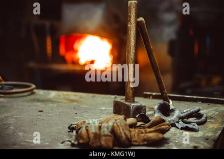 Hand anvil. hummers all blacksmith tools in forge. Stock Photo