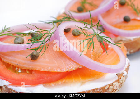 Bagel and Lox. Smoked salmon, cream cheese, tomato, red onion, capers and dill. Stock Photo