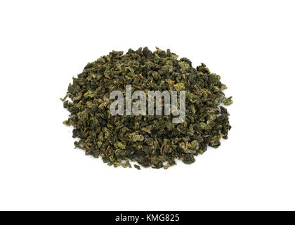 Heap of rolled leaves of Oolong traditional chinese dark green tea isolated on white background Stock Photo