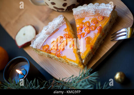 Two slices of sea buckthorn pie Stock Photo