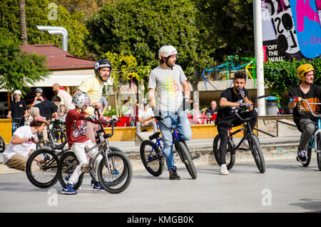 group of Bmx riders at skate park, during freestyle competition, Fuengirola, Spain. Stock Photo