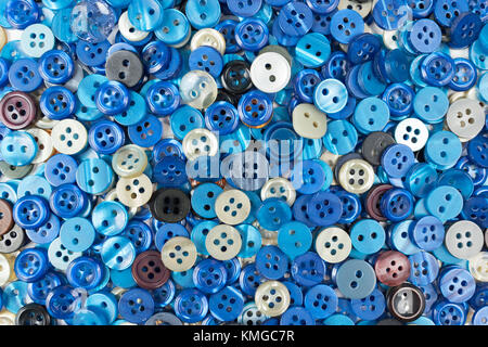 Set of blue sewing buttons on white background Stock Photo