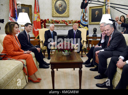 December 7, 2017 - Washington, District of Columbia, United States of America - United States President Donald J. Trump and US Vice President Mike Pence meet with Congressional leadership including US House Minority Leader Nancy Pelosi (Democrat of California), US House Speaker Paul Ryan, (Republican of Wisconsin), US Senate Majority Leader Mitch McConnell (Republican of Kentucky), US Senate Minority Leader Charles Schumer (Democrat of New York) and US Secretary of Defense Jim Mattis in the Oval Office of the White House, December 7, 2017 in Washington, DC. Credit: Olivier Douliery/Pool Stock Photo