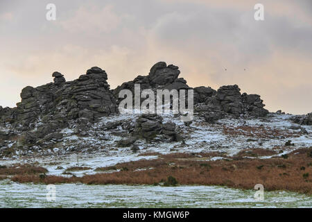 Hound Tor, Dartmoor, UK.  8th December 2017.  UK Weather.  A light dusting of snow covers the landscape at Hound Tor in the Dartmoor National Park in Devon on a day of snow showers and cold temperatures.  Picture Credit: Graham Hunt/Alamy Live News Stock Photo