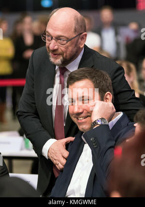 Berlin, Germany. 8th Dec, 2018. Martin Schulz, chairman of the Social Democratic Party, poses with Lars Klingbeil, designated Secretary General of the SPD party, at the federal party conference of the SPD party in Berlin, Germany, 8 December 2018. Credit: Bernd von Jutrczenka/dpa/Alamy Live News Stock Photo