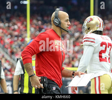 San Francisco 49ers defensive coordinator DeMeco Ryans looks up at a replay  during an NFL football game against the Minnesota Vikings, Sunday, Nov. 28,  2021, in Santa Clara, Calif. (AP Photo/Scot Tucker