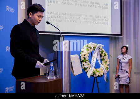 (171212) -- THE HAGUE, Dec. 12, 2017 (Xinhua) -- A representative of Chinese students in the Netherlands addresses a memorial of Nanjing Massacre in The Hague, the Netherlands, on Dec. 12, 2017. Some 200 Chinese people and students living in the Netherlands attended a memorial of Nanjing Massacre, held one day ahead of China's 'National Memorial Day for Nanjing Massacre Victims.' (Xinhua/Rick Nederstigt) Stock Photo