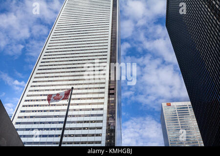 TORONTO, CANADA - DECEMBER 20, 2016: CIBC Headquarters in the center of Toronto, surrounded by skyscrapers and a Canadian flag. The Canadian Imperial  Stock Photo