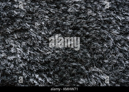 Grey carpet with long pile abstract texture background in close-up (high details) Stock Photo