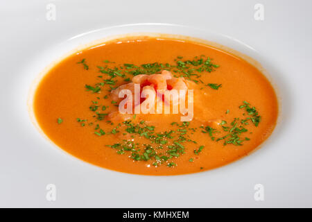 closeup view of plate of soup with shrimps Stock Photo