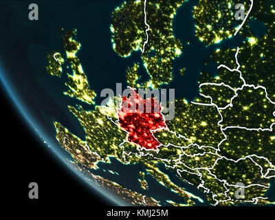 Satellite view of Germany highlighted in red on planet Earth at night with borderlines and city lights. 3D illustration. Elements of this image furnis Stock Photo