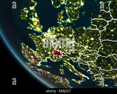 Satellite view of Switzerland highlighted in red on planet Earth at night with borderlines and city lights. 3D illustration. Elements of this image fu Stock Photo