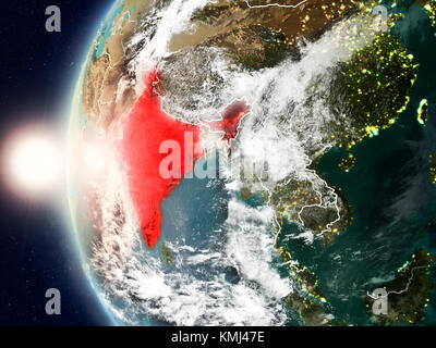 Satellite view of India highlighted in red on planet Earth with clouds and visible country borders during sunset. 3D illustration. Elements of this im Stock Photo