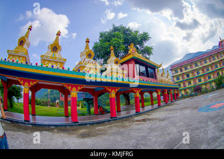 POKHARA, NEPAL - OCTOBER 06 2017: Tibet architecture. Sakya monastery is a pilgrim and tourist destination. Its religious structure is influenced by Mongol style, fish eye effect Stock Photo