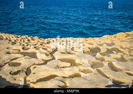 Salt evaporation ponds on Gozo island, Malta Stock Photo