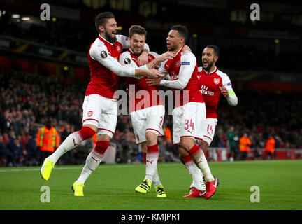 Arsenal's Mathieu Debuchy (centre) celebrates scoring his sides first ...