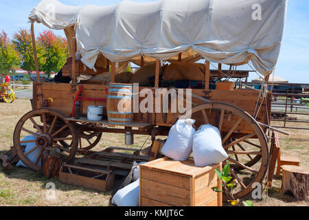 McMinnville, Oregon, USA - August 13, 2016:  A wagon set up and on display at Yamhill County Harvest Festival. Stock Photo