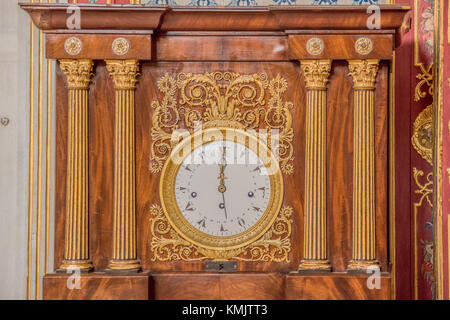 Clock in one of the Topkapı Palace's bedrooms. Dial showing Arabic numerals. Stock Photo