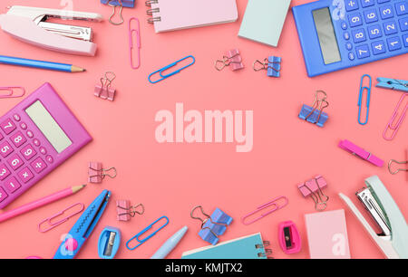 Stationary concept, Flat Lay top view Photo of Scissors, pencils, paper clips,calculator,sticky note,stapler and notepad in pink and blue tone on pink Stock Photo