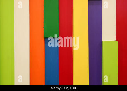 Front view of Multi-colored Wooden Wall for Background and Banner Stock Photo