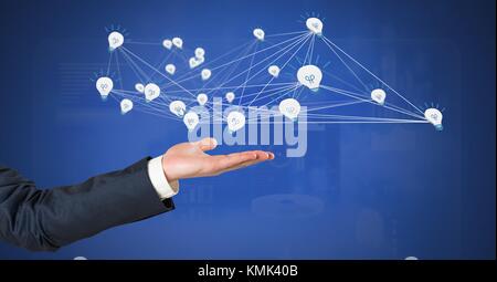 Digital composite of Hand open with 3D connected light bulb idea icons Stock Photo