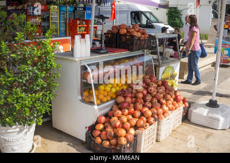Fresh fruit juice of pomegranate (Punica granatum), street stall at Kaleici, the old town of Antalya, turkish riviera, Turkey Stock Photo