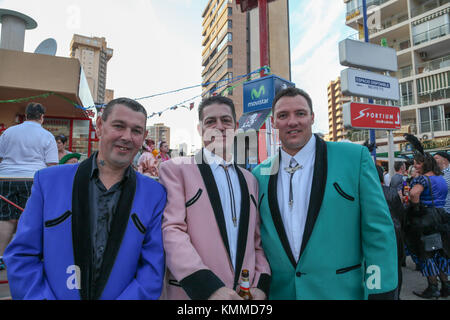 Benidorm new town British fancy dress day group of men dressed as teddy boys Stock Photo