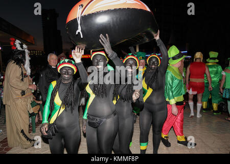 Benidorm new town British fancy dress day group of women dressed as jamaican bobsleigh team Stock Photo