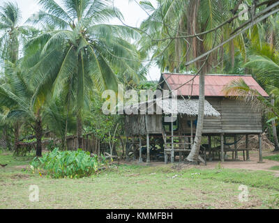 Traditional village house outside Siem Reap.  Approximately 80% of the Cambodian population lives in the countryside. Stock Photo