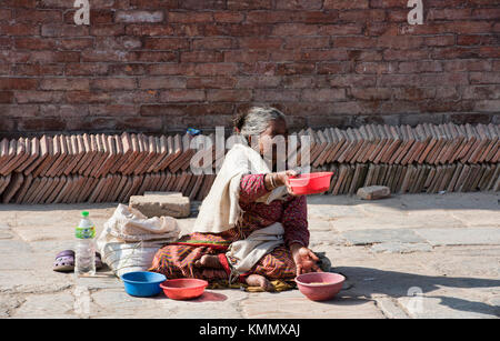 A beggar in Durbar Square, Kathmandu, Nepal Stock Photo