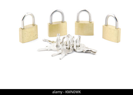 golden closed padlocks with keys isolated on white background Stock Photo
