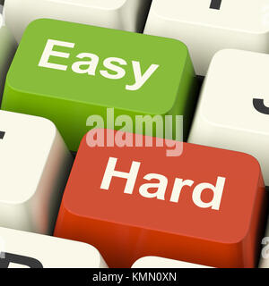 Hard Easy Computer Keys Showing The Choice Of Difficult Or Simple Ways Stock Photo