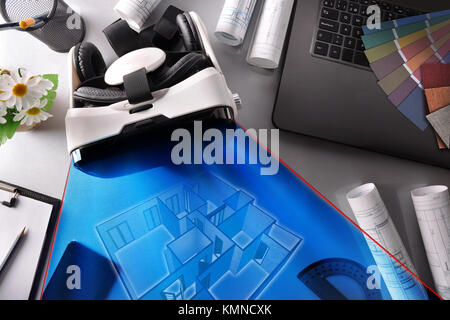 Black and white virtual reality glasses on decorator office table with interior 3d representation. Horizontal composition. Top view Stock Photo