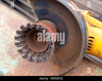 Steel wire rotation brush for angle grinder close up Stock Photo