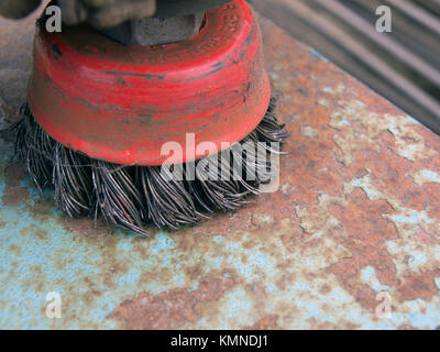 Steel wire rotation brush for angle grinder close up Stock Photo