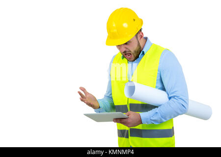 Handsome engineer working with a tablet pc, isolated on white Stock Photo