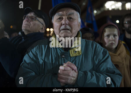 Krakow, Poland. 8th Dec, 2017. A man attends a protest against the new judicial reforms. Today, The Polish parliament approved the government proposals to hand the ruling Law and Justice party (PiS) total control of judicial appointments and the supreme court. Credit: Omar Marques/SOPA/ZUMA Wire/Alamy Live News Stock Photo