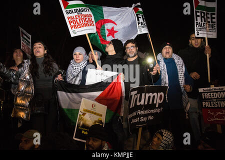 London, UK. 8th Dec, 2017. Thousands of supporters of Palestinian rights protest outside the US embassy against President Trump's move to recognise Jerusalem as the capital of Israel and to transfer the US embassy in Israel from Tel Aviv to Jerusalem. Protests also took place in other cities around the world, notably in the West Bank and Gaza where large protests followed calls by Hamas leader Ismail Haniyeh for a ‘day of rage' and by Fatah leader Mahmoud Abbas for Palestinians to take to the streets. Credit: Mark Kerrison/Alamy Live News Stock Photo