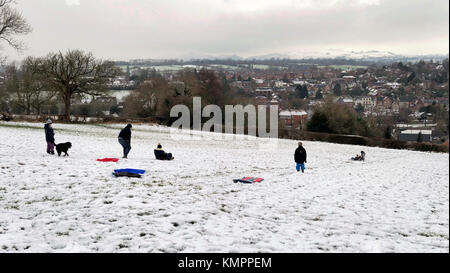 Ashbourne, Derbyshire, UK. 09th Dec, 2017. UK Weather: sledging fun in the snow above Ashbourne Derbyshire in the Peak District National Park Credit: Doug Blane/Alamy Live News Stock Photo