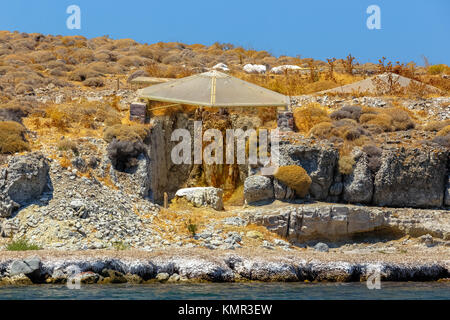 A fossilized colorful tree trunk from the UNESCO Geopark 'Petrified Forest of Sigri' on the island of Lesvos in Greece. Stock Photo