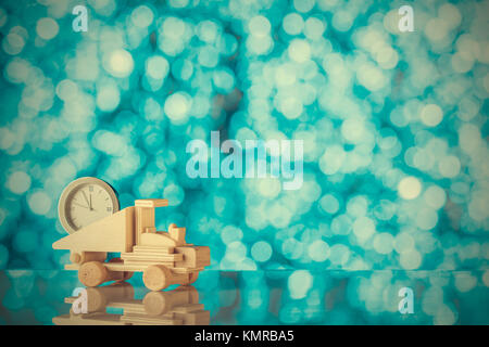 Background for Your design. Wooden truck is bringing us a new year. Place for text. Blurred background. Stock Photo