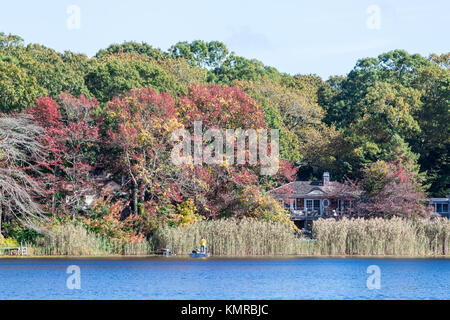 landscape including a little bit of a house and water in southampton, ny Stock Photo